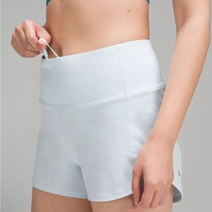 size 4, length (tall), light blue lululemonshorts, with high rise at the waist.